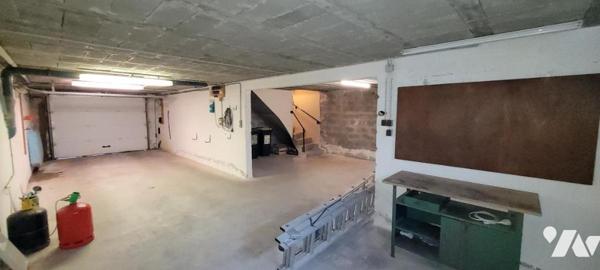 MAISON DANS LE BOURG DE GUIDEL