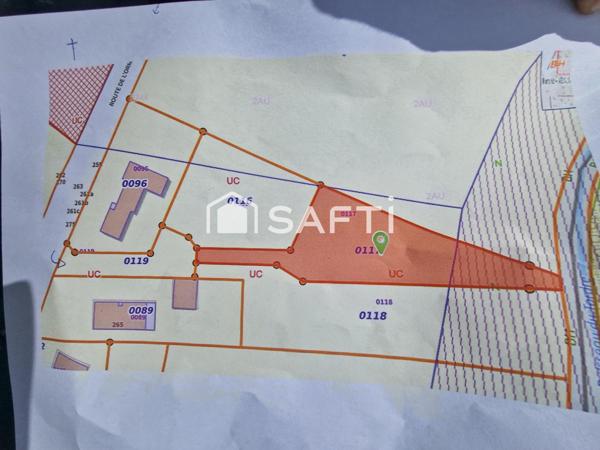 Jolie terrain plat constructible au calme.