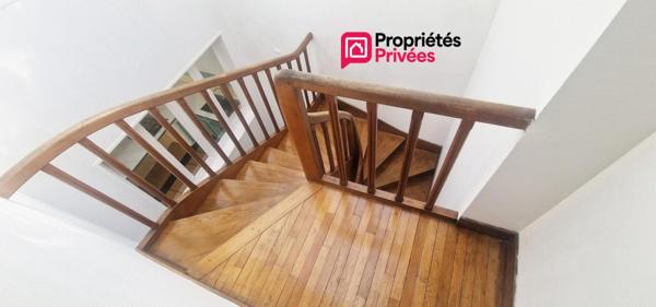 Immeuble de 94 m² avec commerce et logement 3 pièces et 2 chambres