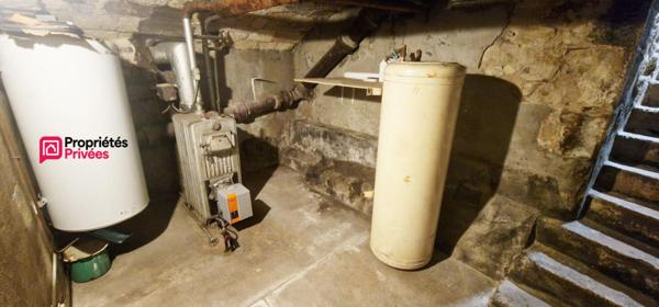 Immeuble de 94 m² avec commerce et logement 3 pièces et 2 chambres