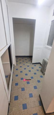 Immeuble de 94 m² avec commerce et logement 3 pièces et 2 chambres