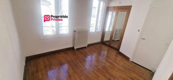 Immeuble de 94 m² avec commerce et logement 3 pièces et 2 chambres