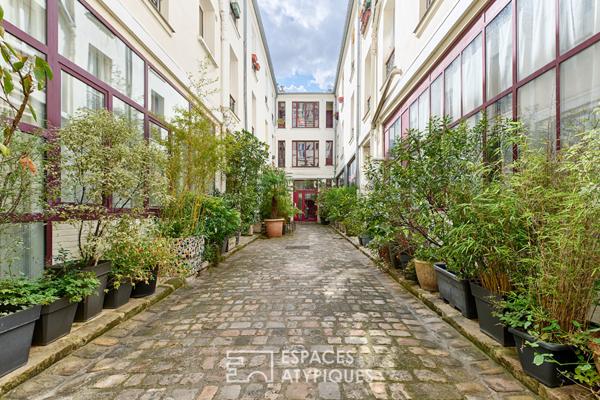 Ancien atelier transformé en loft au calme sur cour végétalisée