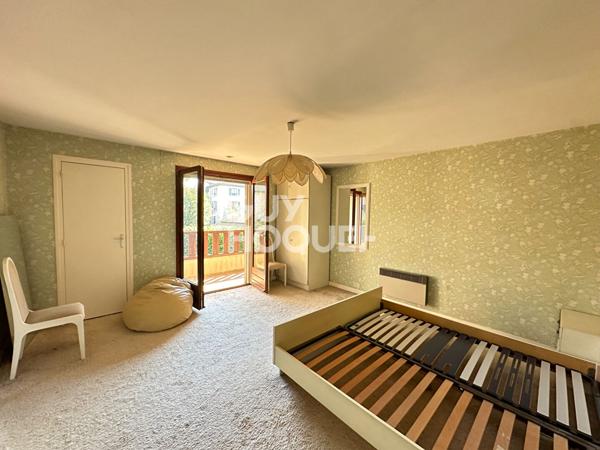 Maison familiale 3 niveaux sur terrain de 1 800 m²