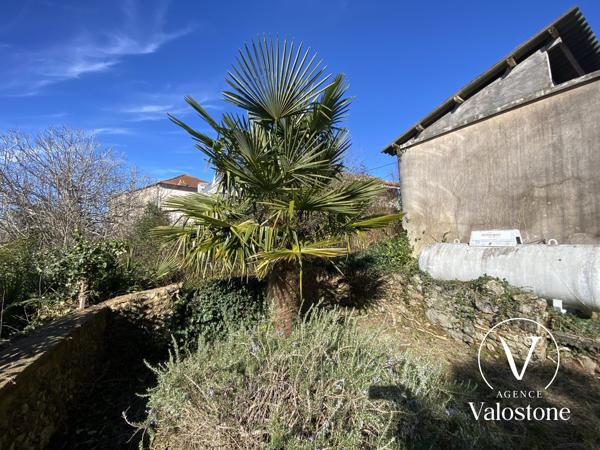 Maison de bourg réaménagée  en 2 appartements