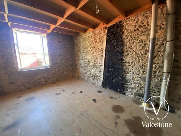 Maison de bourg réaménagée  en 2 appartements