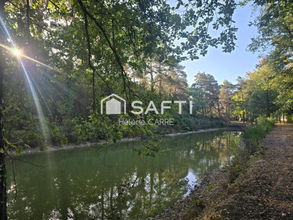 Terrain de loisir avec petit étang de -1 000 m²