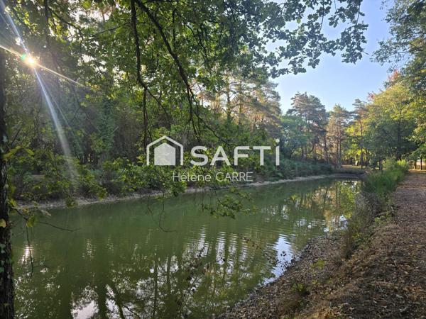Terrain de loisir avec petit étang de -1 000 m²