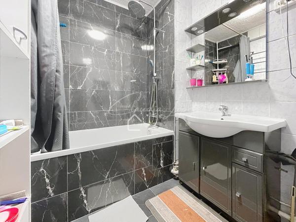 Appartement F4 avec cave et parking sécurisé