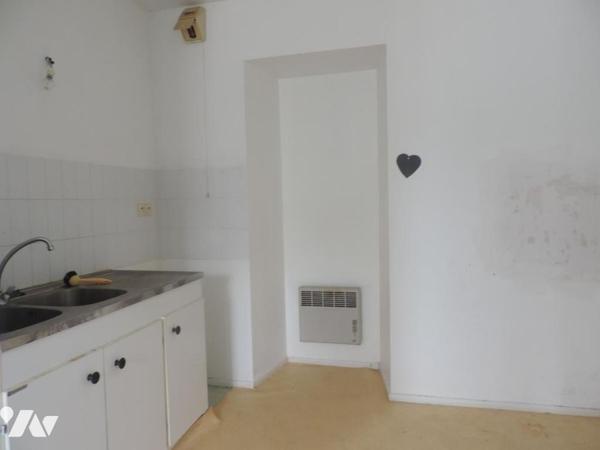 PLOUGONVER, Maison comprenant quatre logements