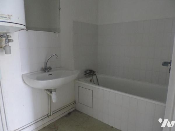 PLOUGONVER, Maison comprenant quatre logements