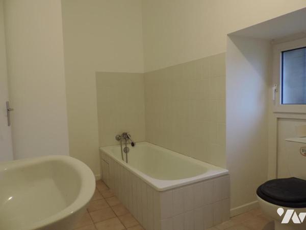 PLOUGONVER, Maison comprenant quatre logements