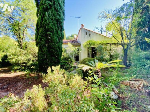 Maison T5 à rénover avec garage et jardin attenant