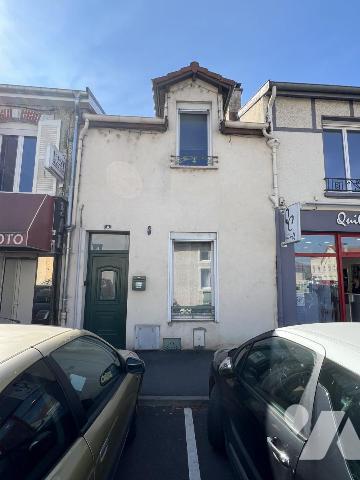 Maison d'habitation mitoyenne