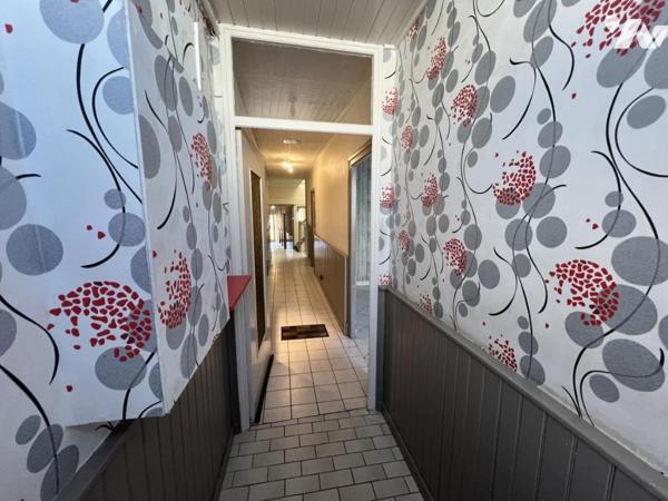 Maison d'habitation mitoyenne