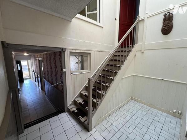 Maison d'habitation mitoyenne