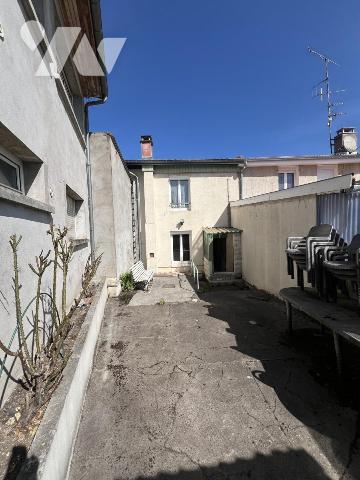 Maison d'habitation mitoyenne