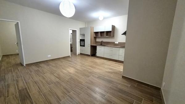 Immeuble avec 4 appartements et un garage à vendre à NIMES (30)