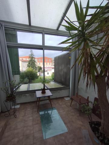 Maison de ville avec garage et jardin à quelques pas du centre ville