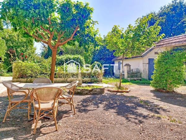 Authentique Béarnaise 213M2 avec dépendances et jardin à l’anglaise