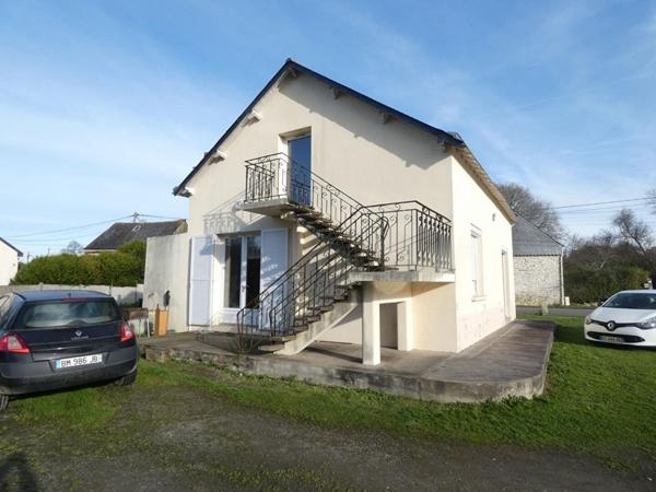 Maison dans un parc avec étang