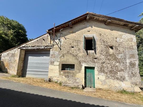 Grange d'environ 307 m2 et garage d'environ 70 m2