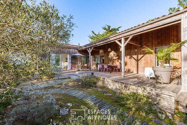 Maison à ossature bois, douceur de vivre les pieds dans le sable