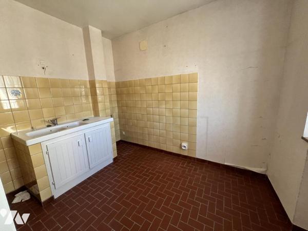 SPECIAL INVESTISSEUR : Un ensemble immobilier de 14 appartements et 8 garages