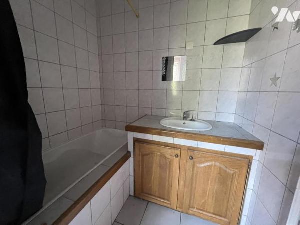 SPECIAL INVESTISSEUR : Un ensemble immobilier de 14 appartements et 8 garages