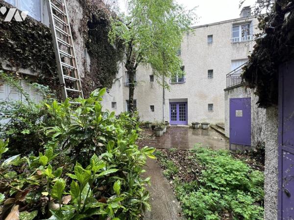 SPECIAL INVESTISSEUR : Un ensemble immobilier de 14 appartements et 8 garages