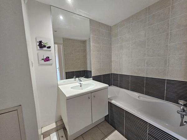 Appartement Craponne 97.61 m2 comprenant 4 pièces, 3 chambres dont suite parentale avec dressing