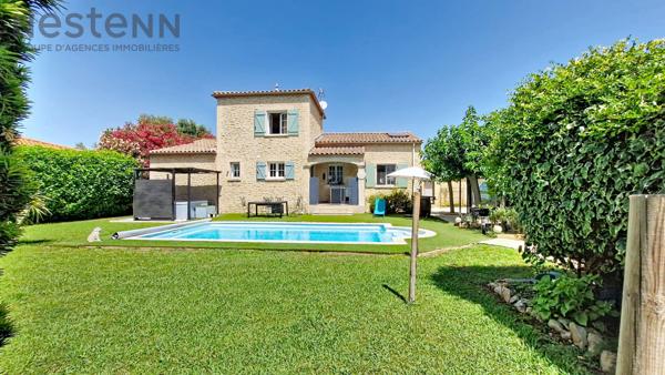 Élégante villa familiale avec piscine et jardin arboré, au calme absolu