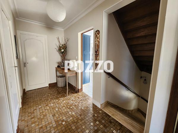 Ensemble immobilier avec maison familiale, appartement loué et terrain constructible à Tourlaville CHERBOURG EN COTENTIN