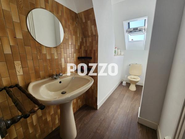 Ensemble immobilier avec maison familiale, appartement loué et terrain constructible à Tourlaville CHERBOURG EN COTENTIN