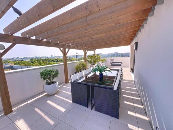 Élégance, confort et luminosité : découvrez ce superbe appartement avec grande terrasse au cœur de Bezannes.
