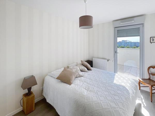 Élégance, confort et luminosité : découvrez ce superbe appartement avec grande terrasse au cœur de Bezannes.