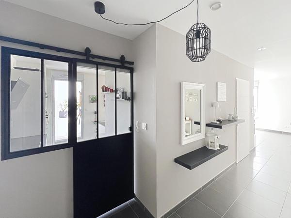 Élégance, confort et luminosité : découvrez ce superbe appartement avec grande terrasse au cœur de Bezannes.