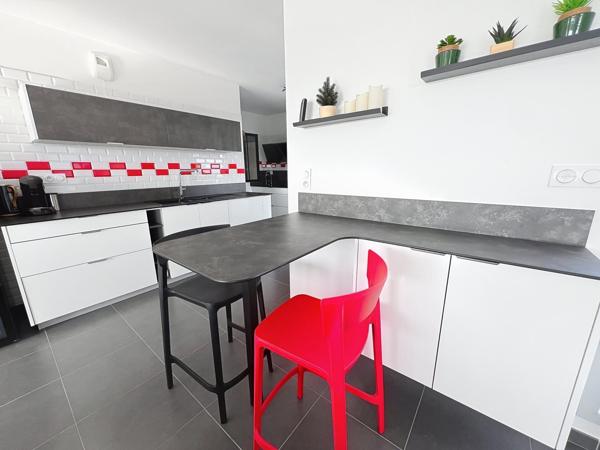 Élégance, confort et luminosité : découvrez ce superbe appartement avec grande terrasse au cœur de Bezannes.