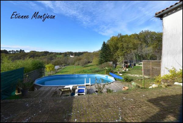 Maison 153 m² 5 chambres, jardin, garage et piscine.