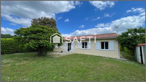Pavillon plain-pied, trois chambres, salle de bain, garage, jardin.