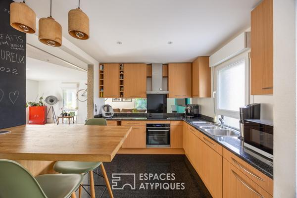 Appartement type loft d’architecte avec jardin plein sud