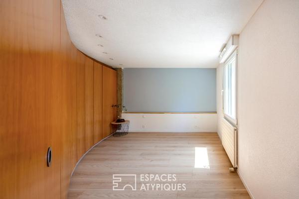 Appartement type loft d’architecte avec jardin plein sud