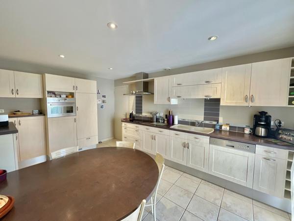 Maison de plain-pied 121m2, 3 chambres, 1 mezzanine, 1 garage proche du centre de Mouilleron