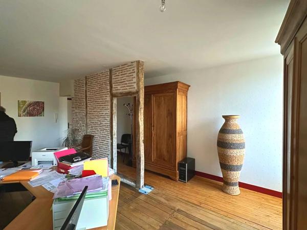 Immeuble à usage mixte à Saint-Savin – Emplacement idéal et revenue potentiel