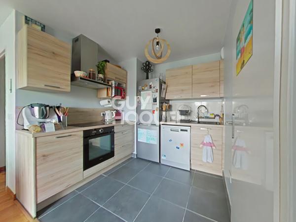 IMMEUBLE RECENT - DPE C - STATIONNEMENT ET CAVE