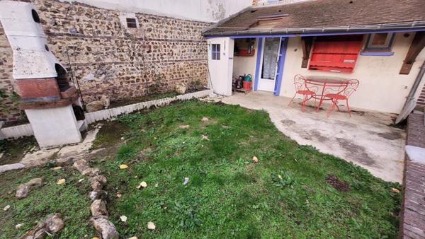 Maison de ville avec terrasse et jardinet