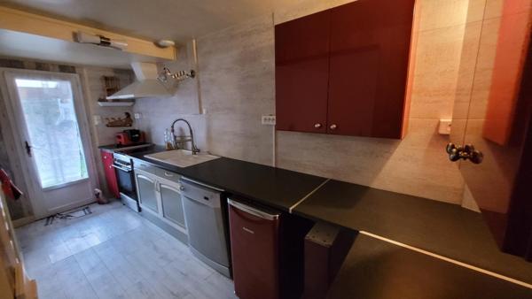 Maison de ville avec terrasse et jardinet