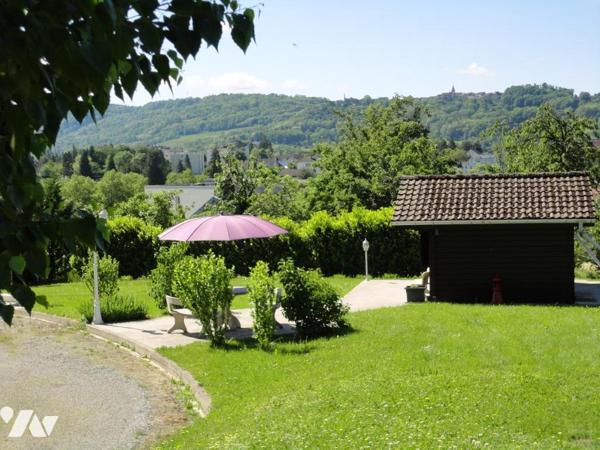 A vendre sur la commune de LONS LE SAUNIER maison de 215m² 