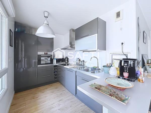 Appartement 3 pièces de 58 m² avec balcon et parking