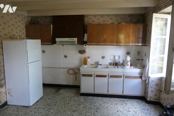 Ancien corps de ferme à rénover sur plus d'1hectare en plein cœur de TONNAY-CHARENTE.